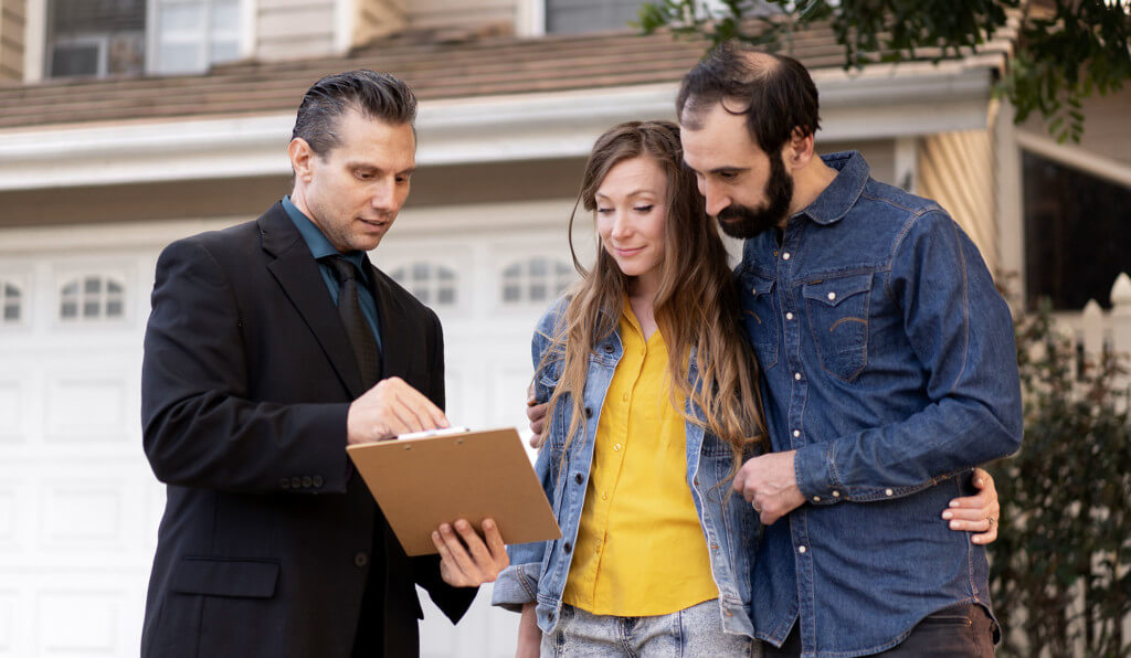 seller agent showing offer to a couple